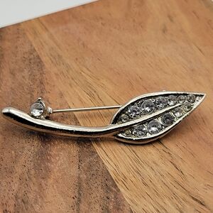 Elegant Silver Leaf Brooch with Crystal Accents